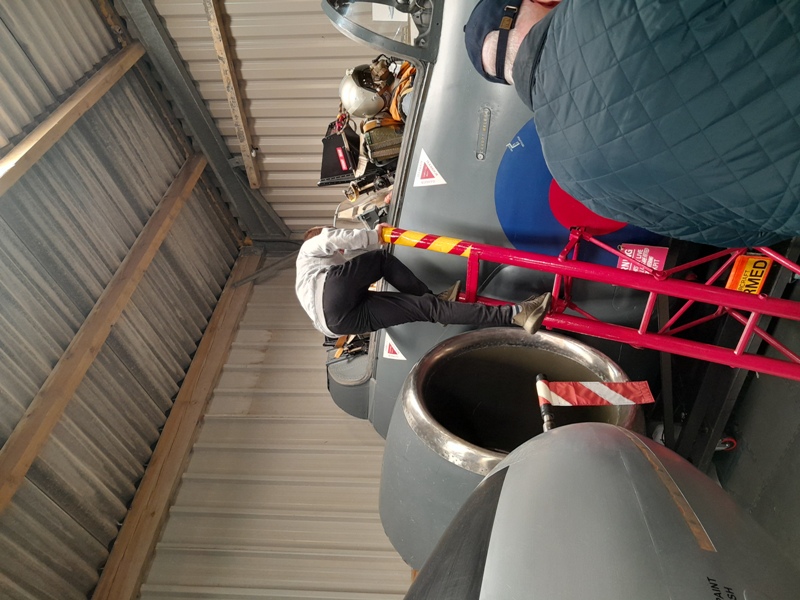 Climbing into the cockpit of a Blackburn Buccaneer at Stoneykirk Aviation Museum