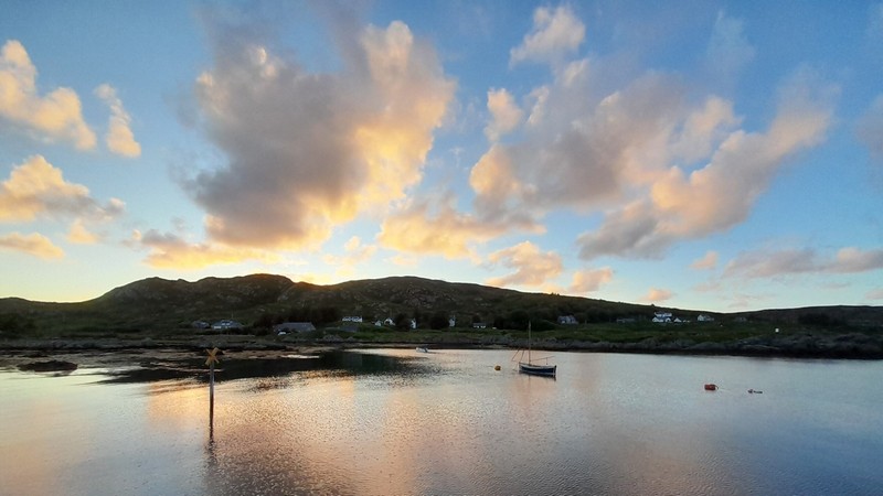 Sunset at Scalasaig the main village on Colonsay