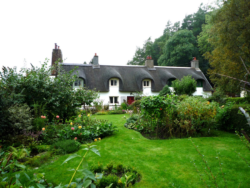 Row of thatch roof cottages in Fortingall