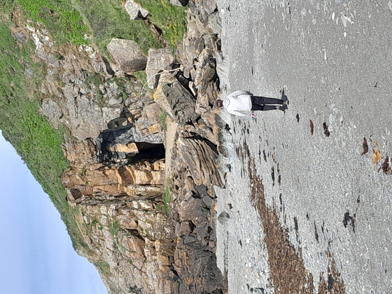 Approach to St Ninian's Cave via a pebble beach